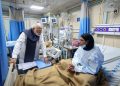 Sweeping police raids target banned group in Kashmir